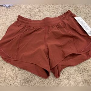 Lululemon 4 inch dark purple/red shorts